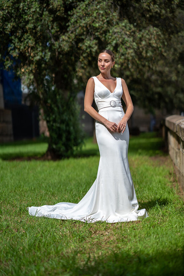 Woman posing in the stunning Laila wedding gown by Roya Javaheri