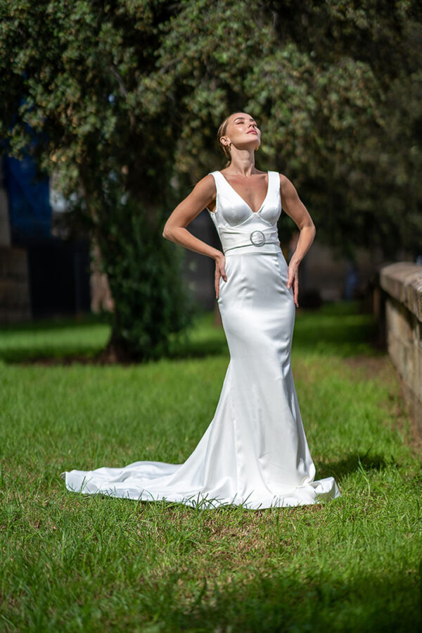 Woman posing in the stunning Laila wedding gown by Roya Javaheri