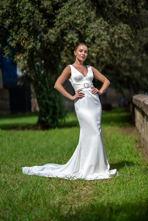 Woman posing in the stunning Laila wedding gown by Roya Javaheri