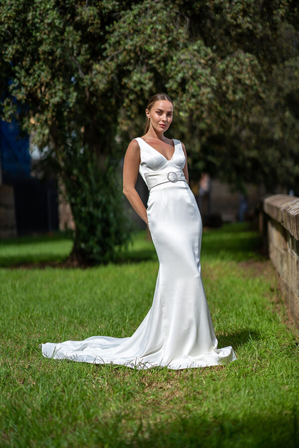 Woman posing in the stunning Laila wedding gown by Roya Javaheri