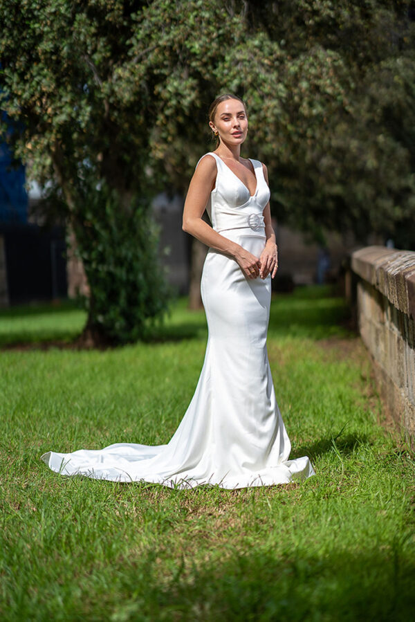 Woman posing in the stunning Laila wedding gown by Roya Javaheri