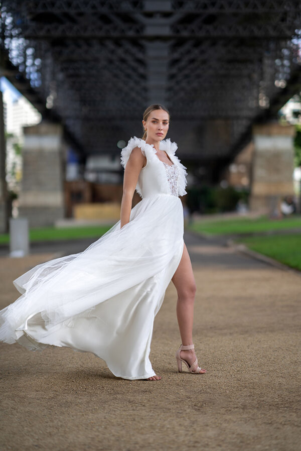 Woman wearing a stunning Roya Javaheri wedding dress