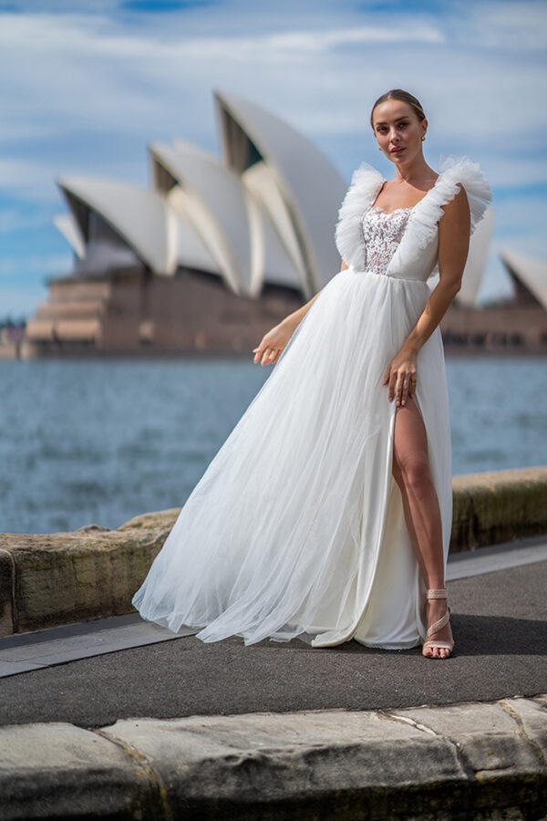 Woman wearing a stunning Roya Javaheri wedding dress