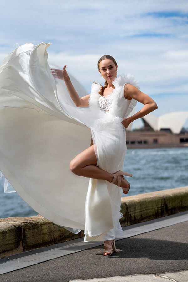 Woman wearing a stunning Roya Javaheri wedding dress