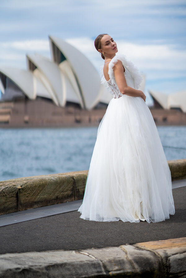 Woman wearing a stunning Roya Javaheri wedding dress