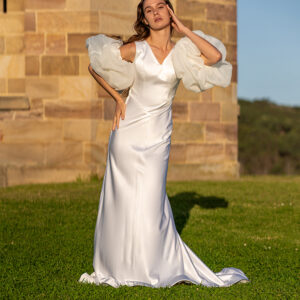 Woman wearing a stunning Roya Javaheri wedding gown with Angel detachable sleeves